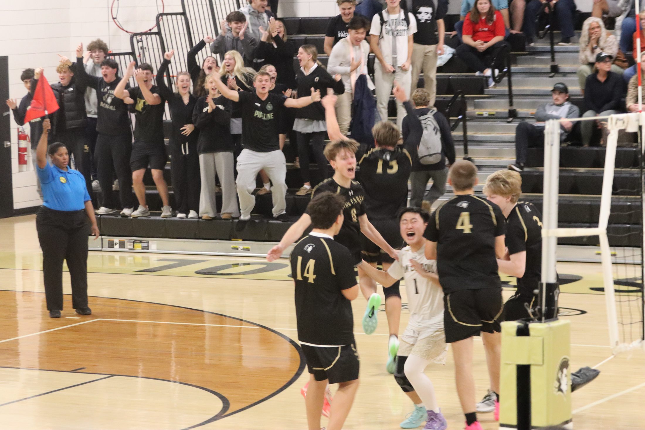 John Carroll Patriots celebrating a win with the student section